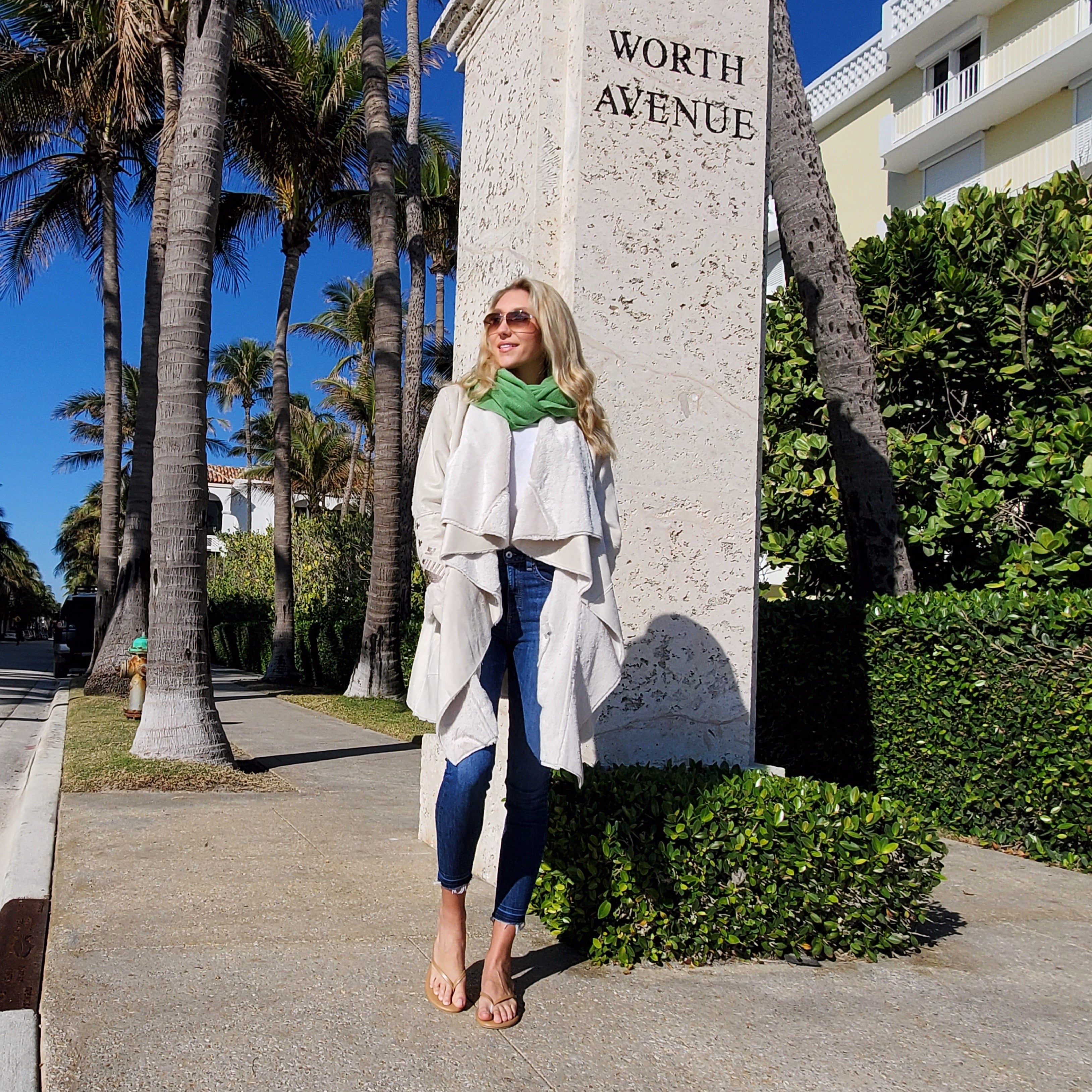 Model on Worth Avenue wearing solei sea nude and pink flip flop sandals