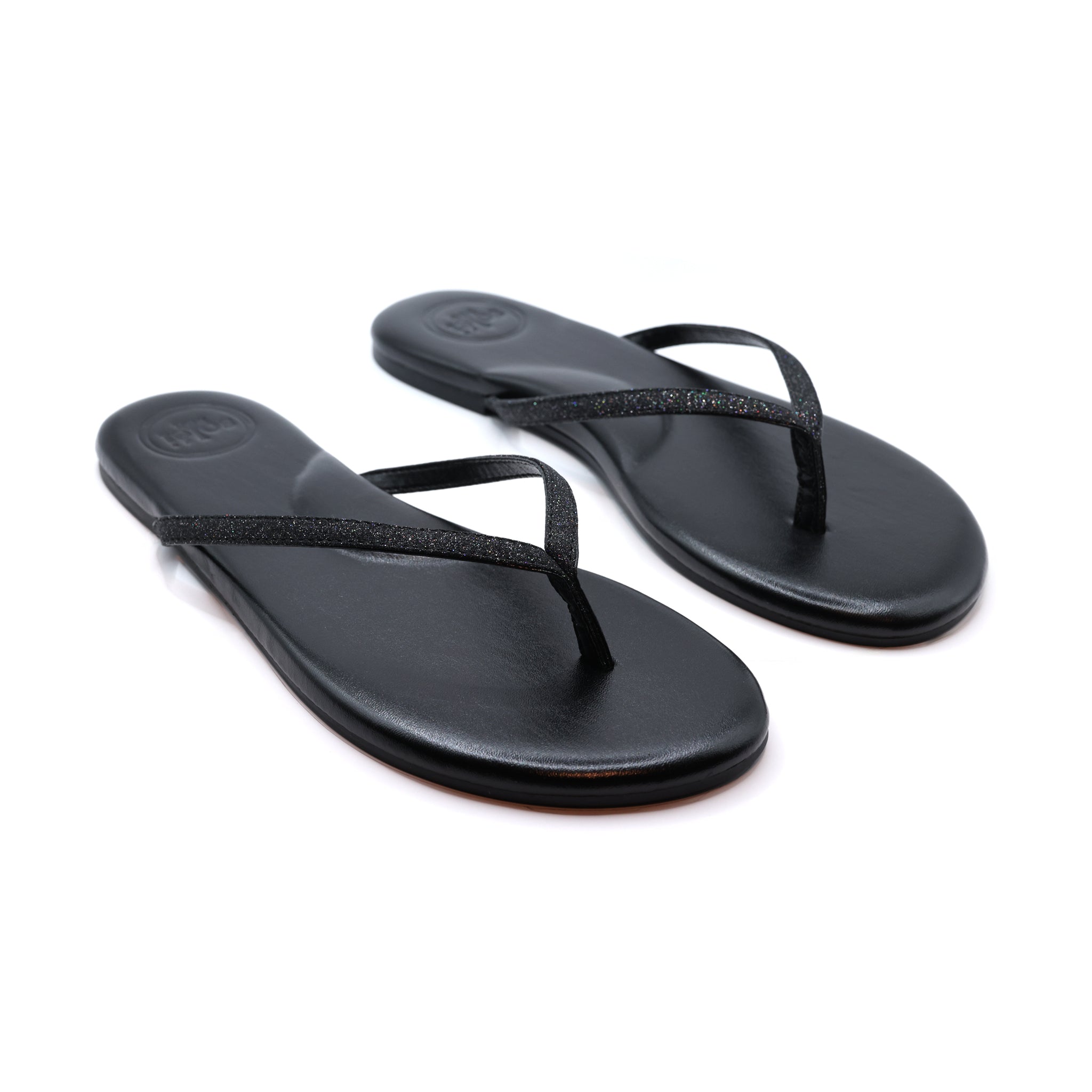 Women's think strap flip flop sandal. Black with Black and Glitter straps. Comfort and style. Padded footbed and arch support.