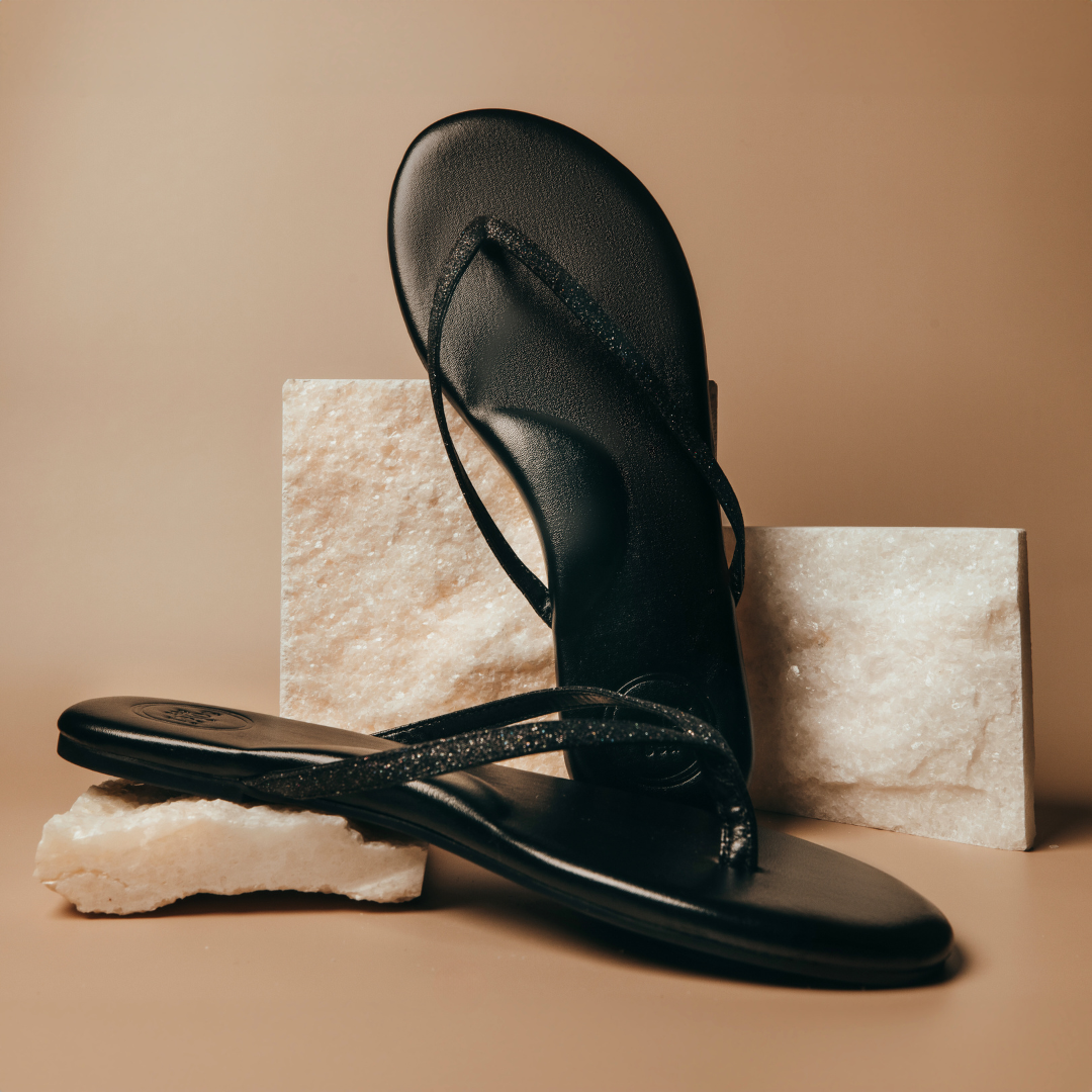 Indie Flip Flop in all black with glitter straps, padded footbed, and padded arch support