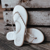 Solei Perla Sandal is Pearly Pink with light shimmer and white pearls on the strap