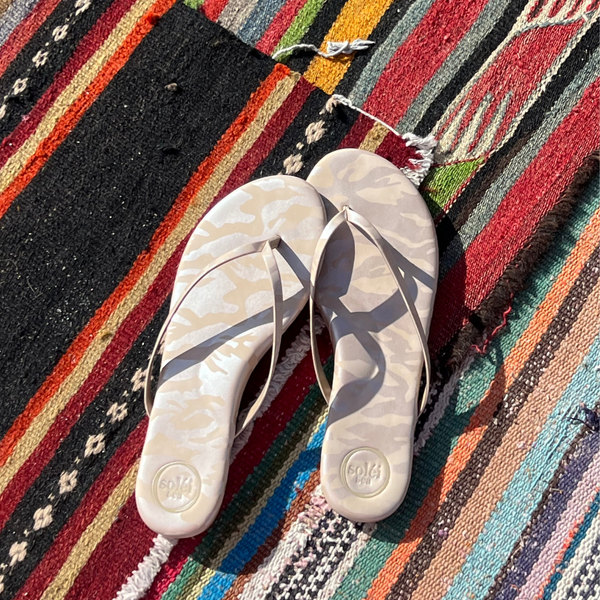 Beautiful flip flop sandals in tan camo with metallic overtone
